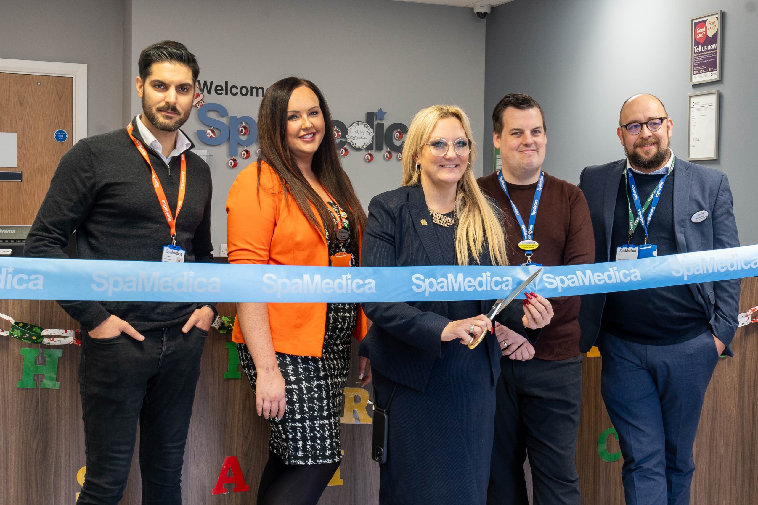 Amanda Martin MP pictured alongside SpaMedica's senior leadership team at a ribbon cutting ceremony